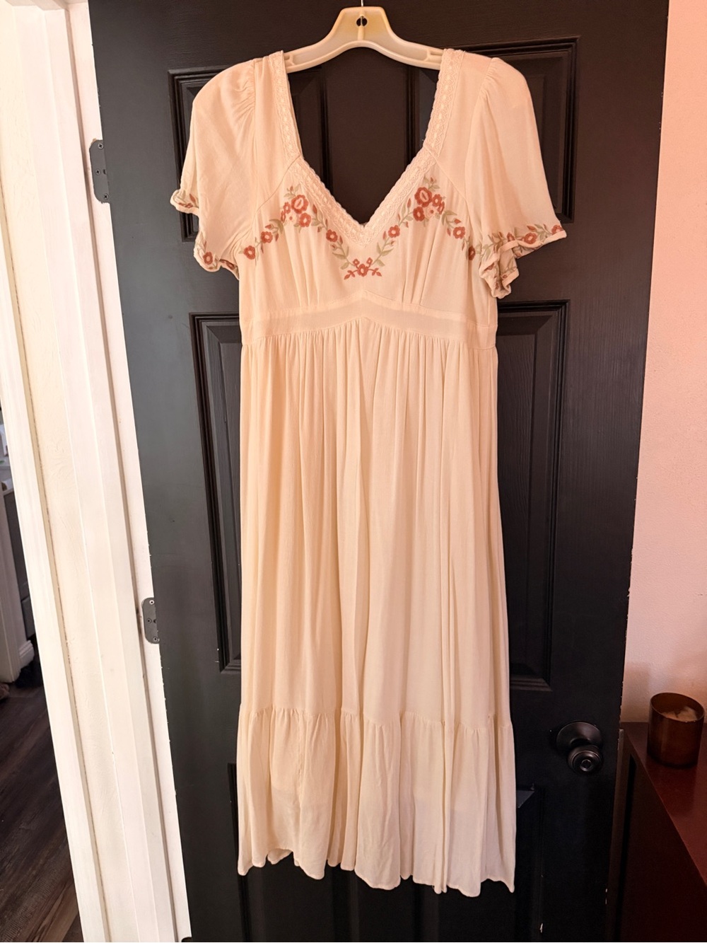Cream colored midi dress with floral embroidery
